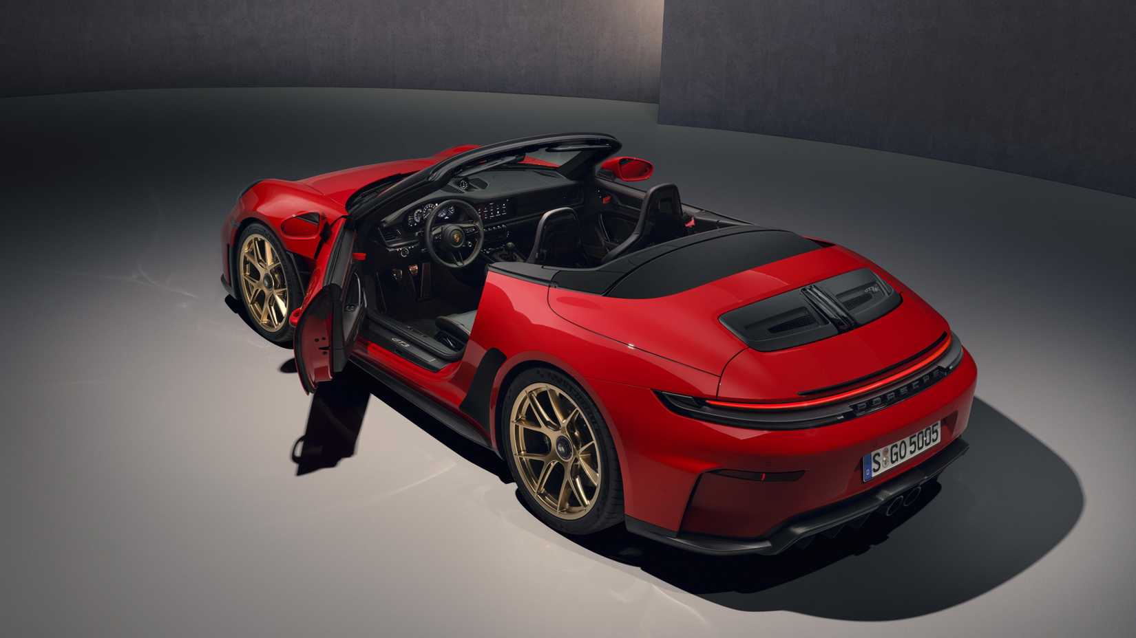 A dramatic studio shot of the 2026 Porsche 911 GT3 S/C