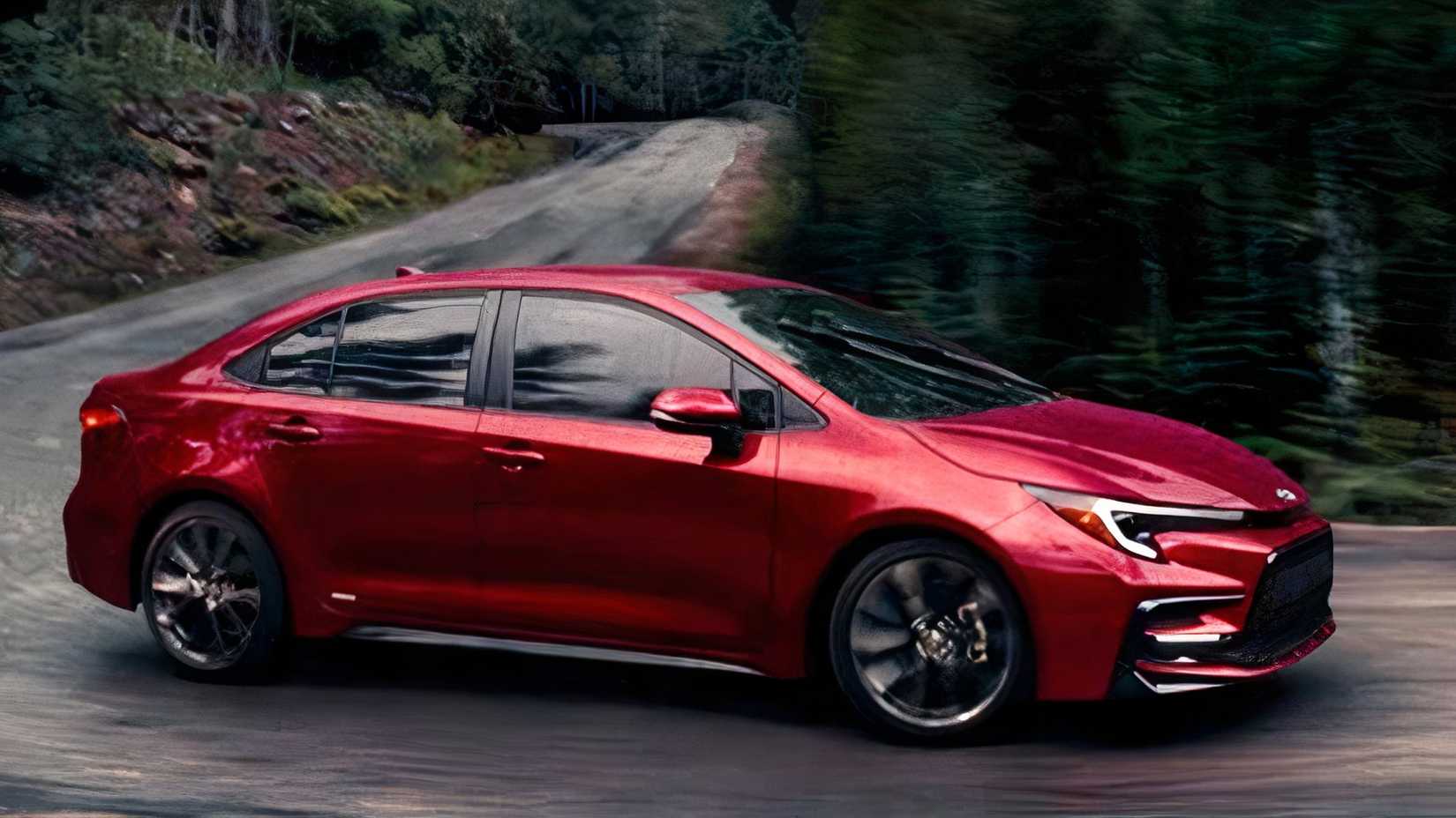 Vista lateral do Toyota Corolla Hybrid vermelho 2026 enquanto faz uma curva