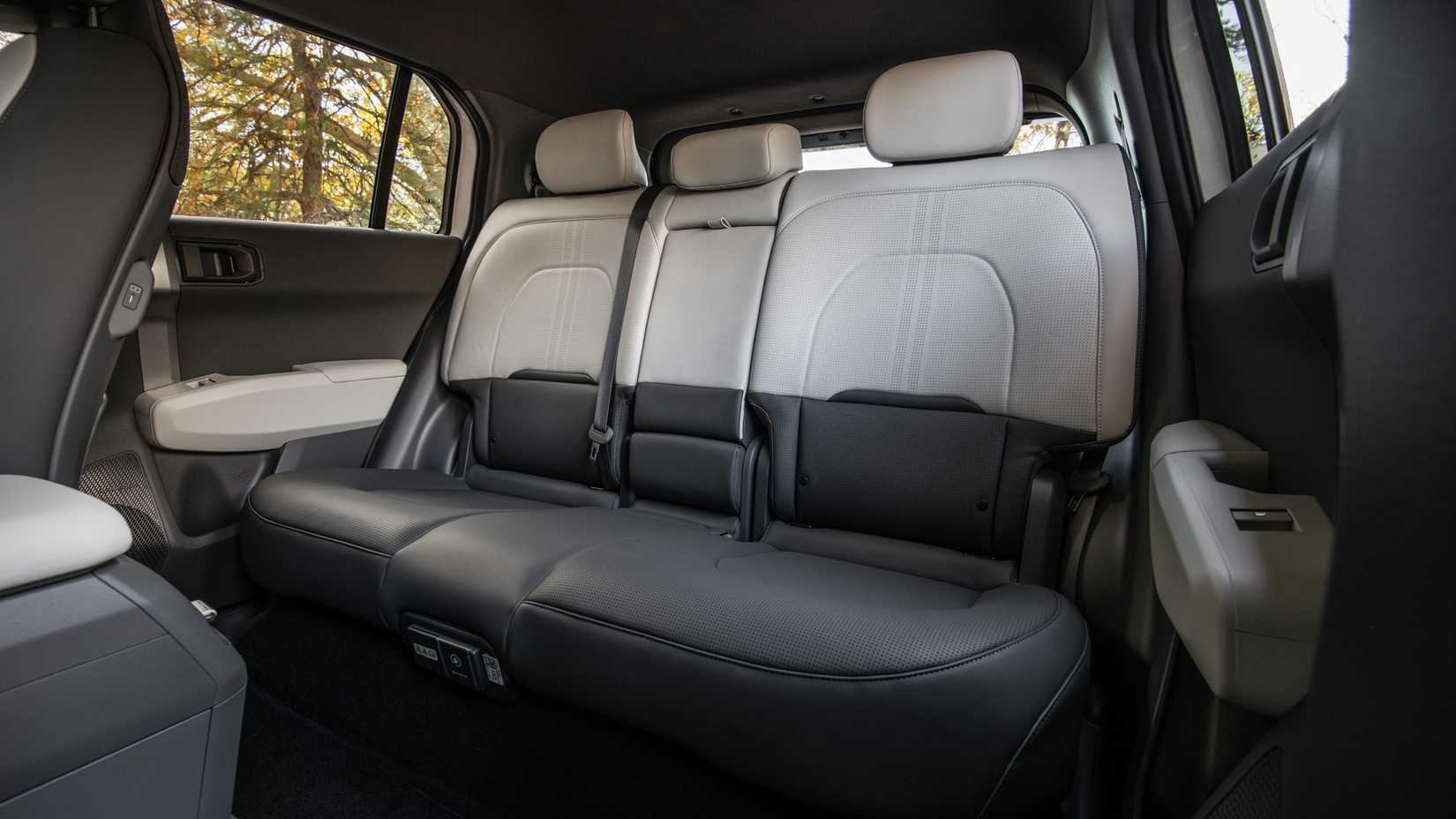 An interior shot of the 2027 Kia EV3's rear seats