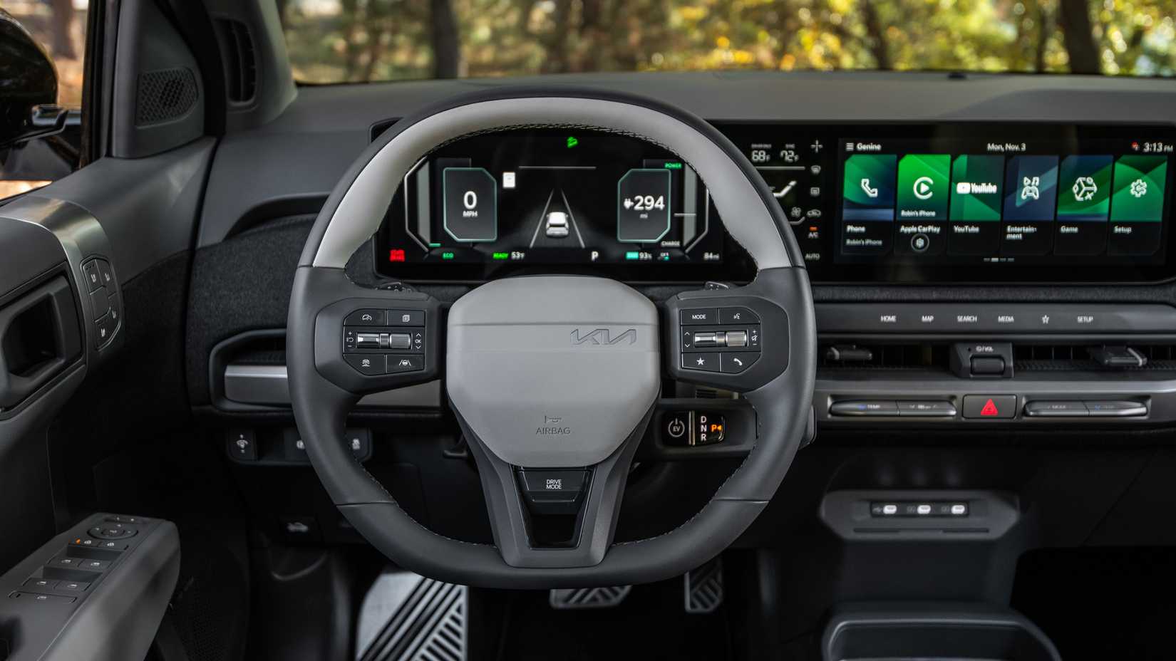 An interior shot of the 2027 Kia EV3 from the driver's POV