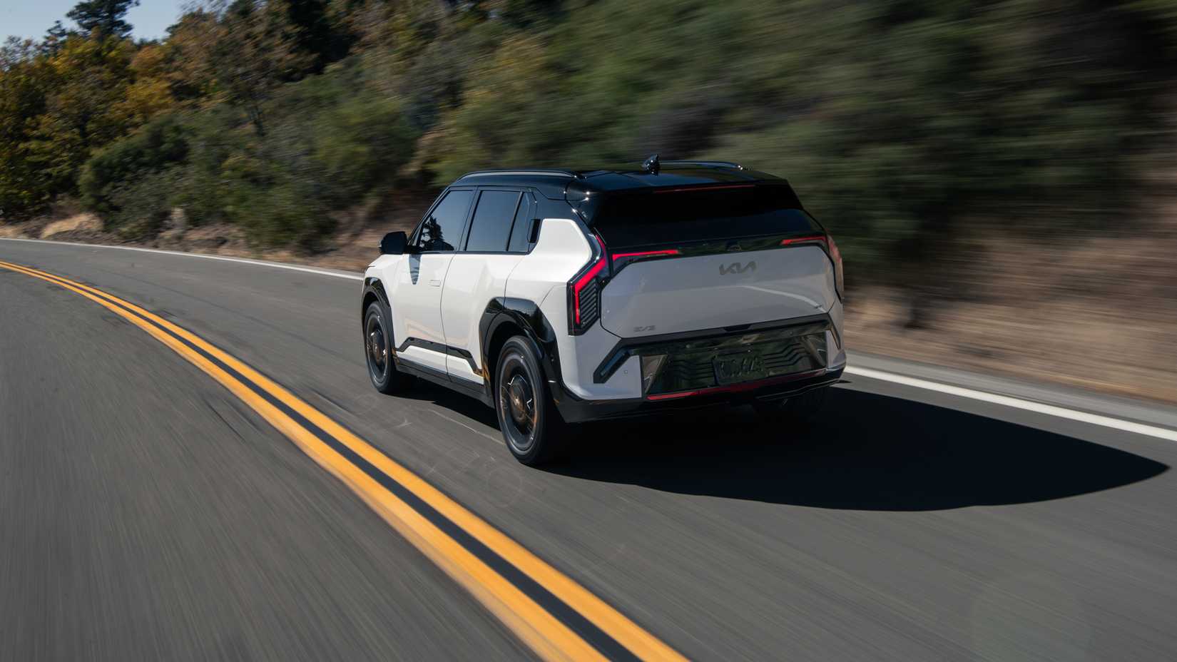 An action shot of the 2027 Kia EV3 on a mountain road