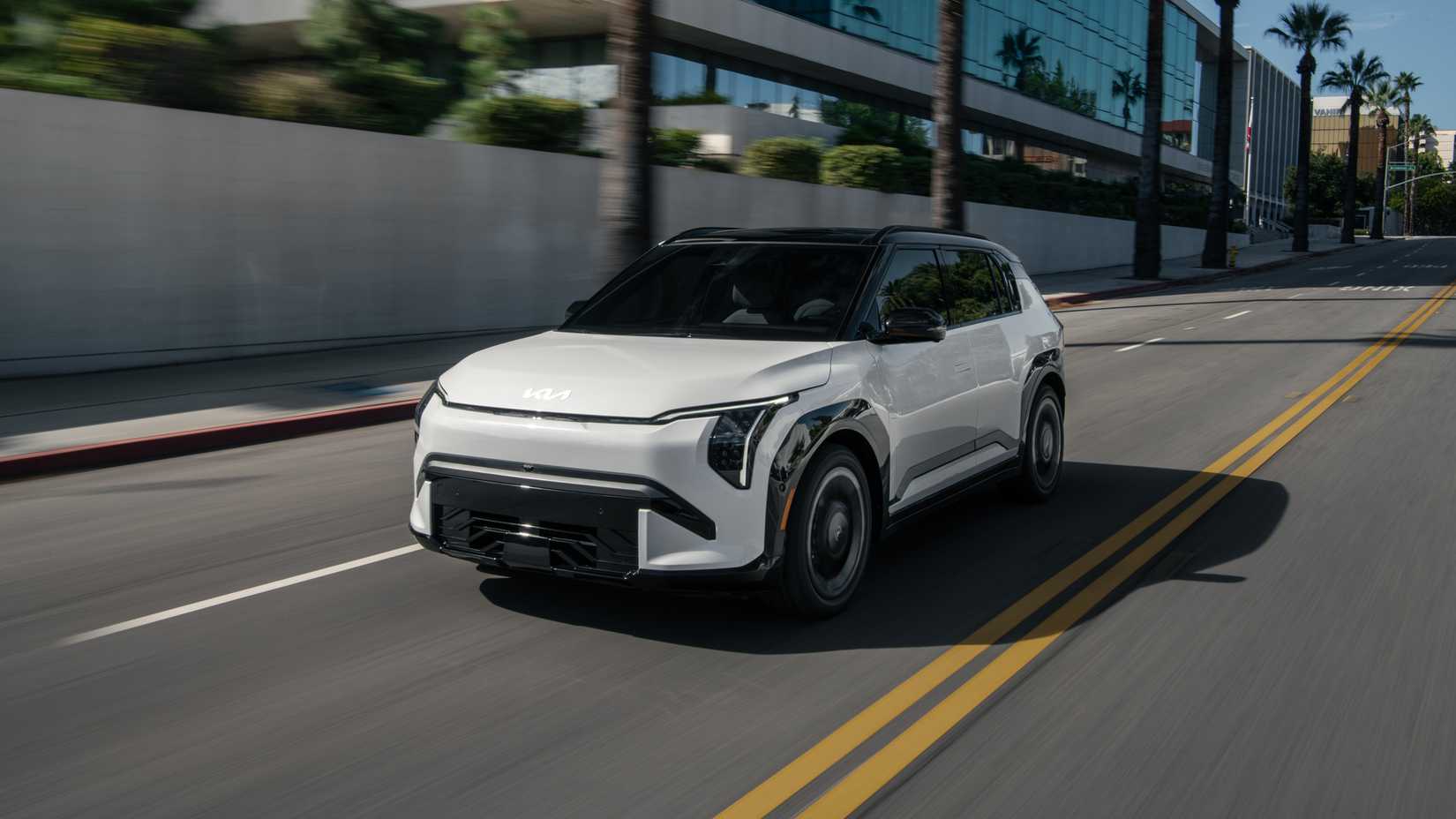 An action shot of the 2027 Kia EV3 in the city