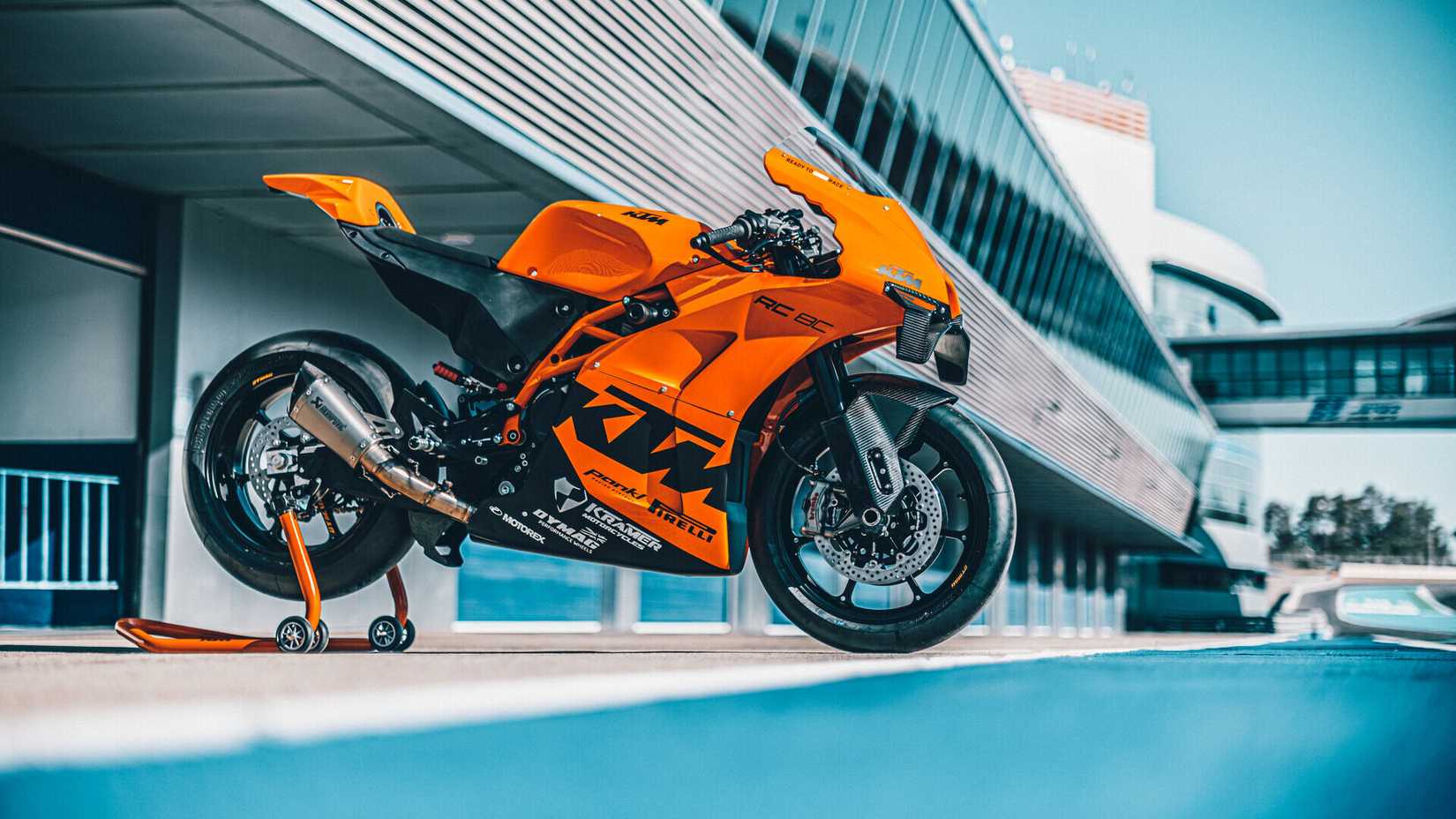 A 2022 KTM RC 8C parked on a racetrack