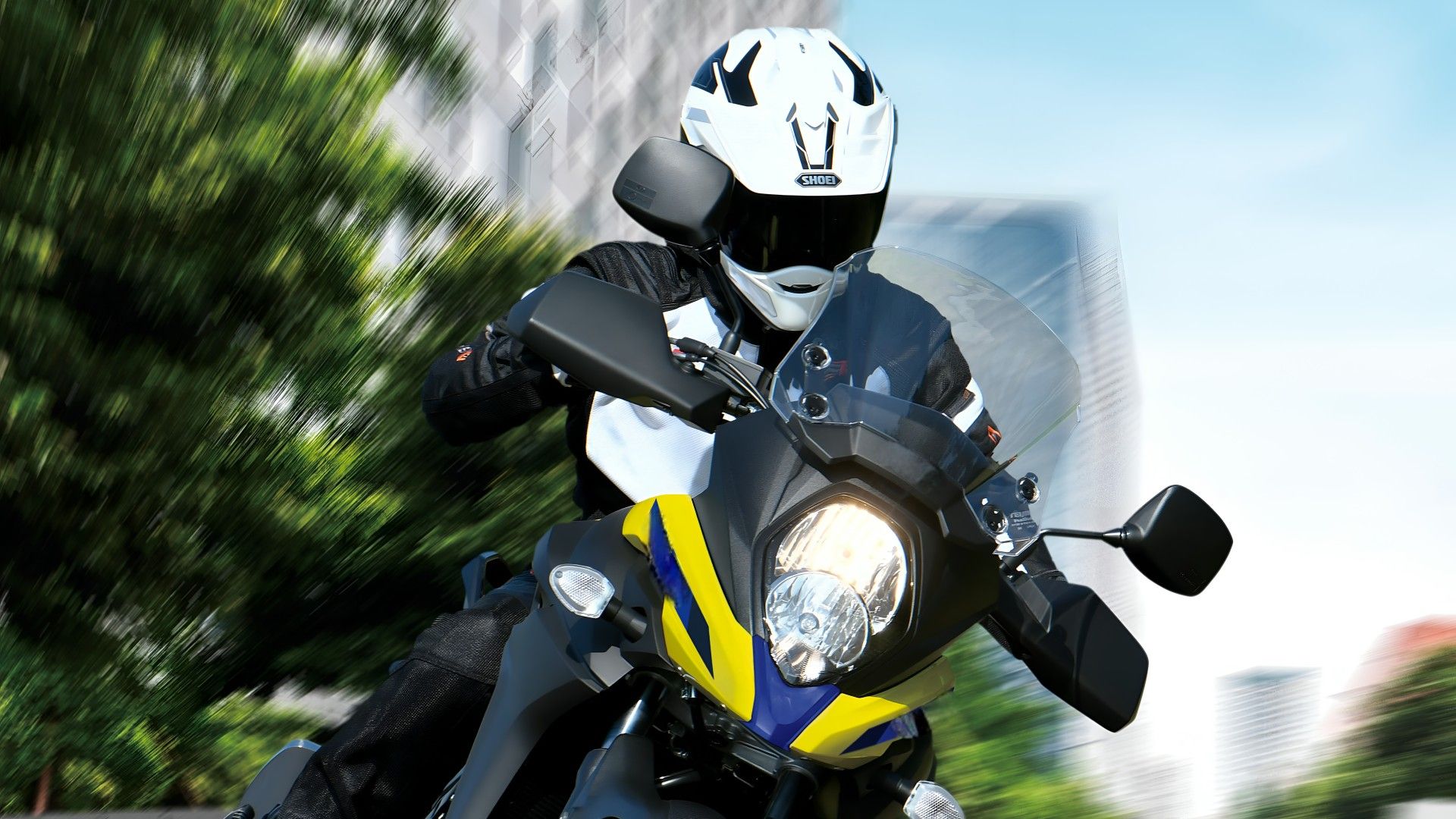 2026 Suzuki V-Strom 650XT em curva em close-up rápido