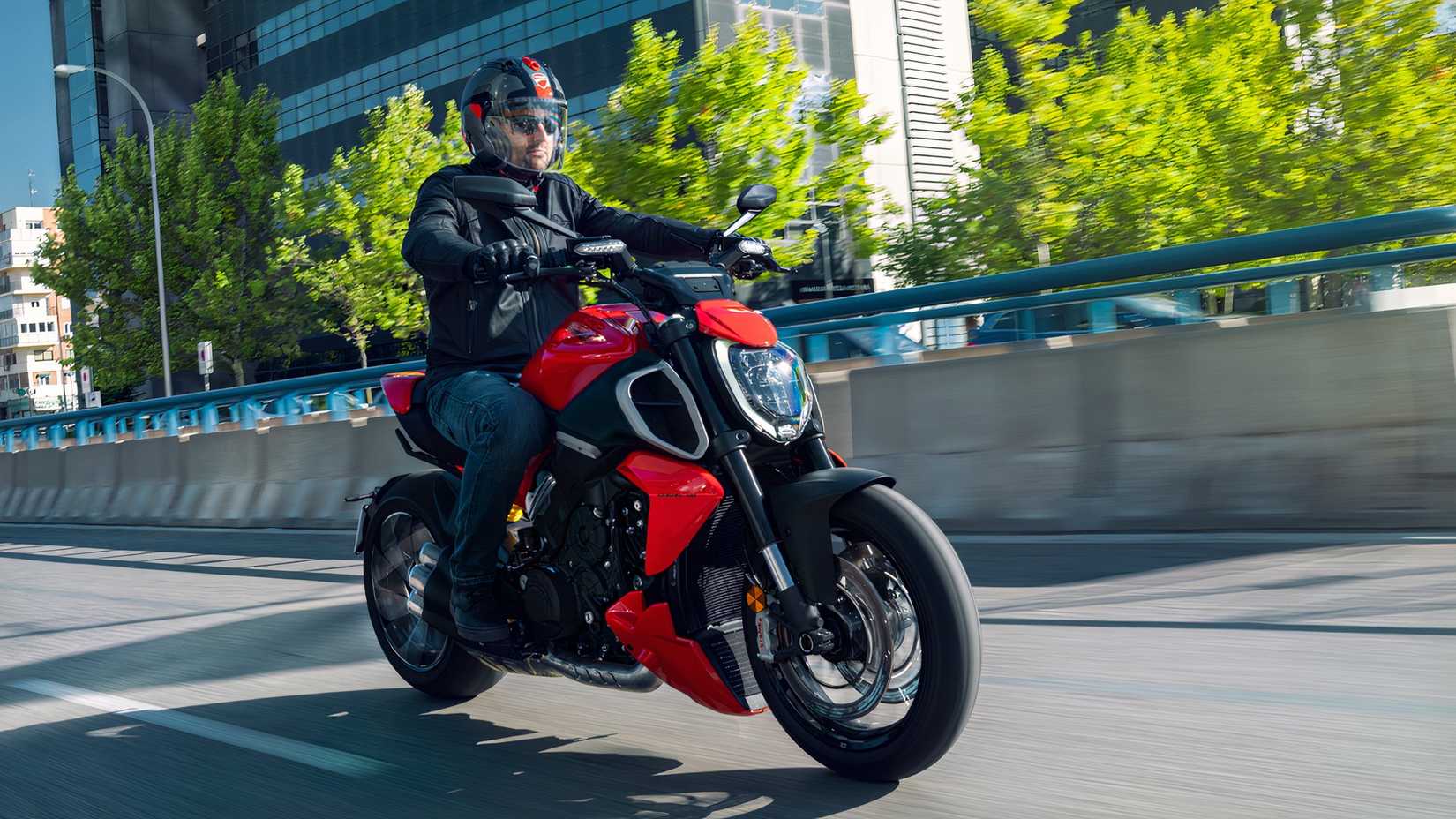 Rider cruising on a Ducati Diavel V4 