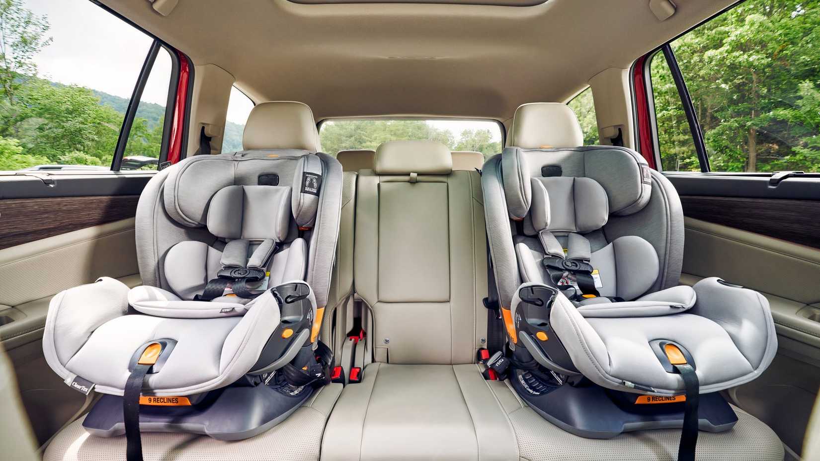 2026 Volkswagen Atlas interior shot showing rear seats with child safety seats