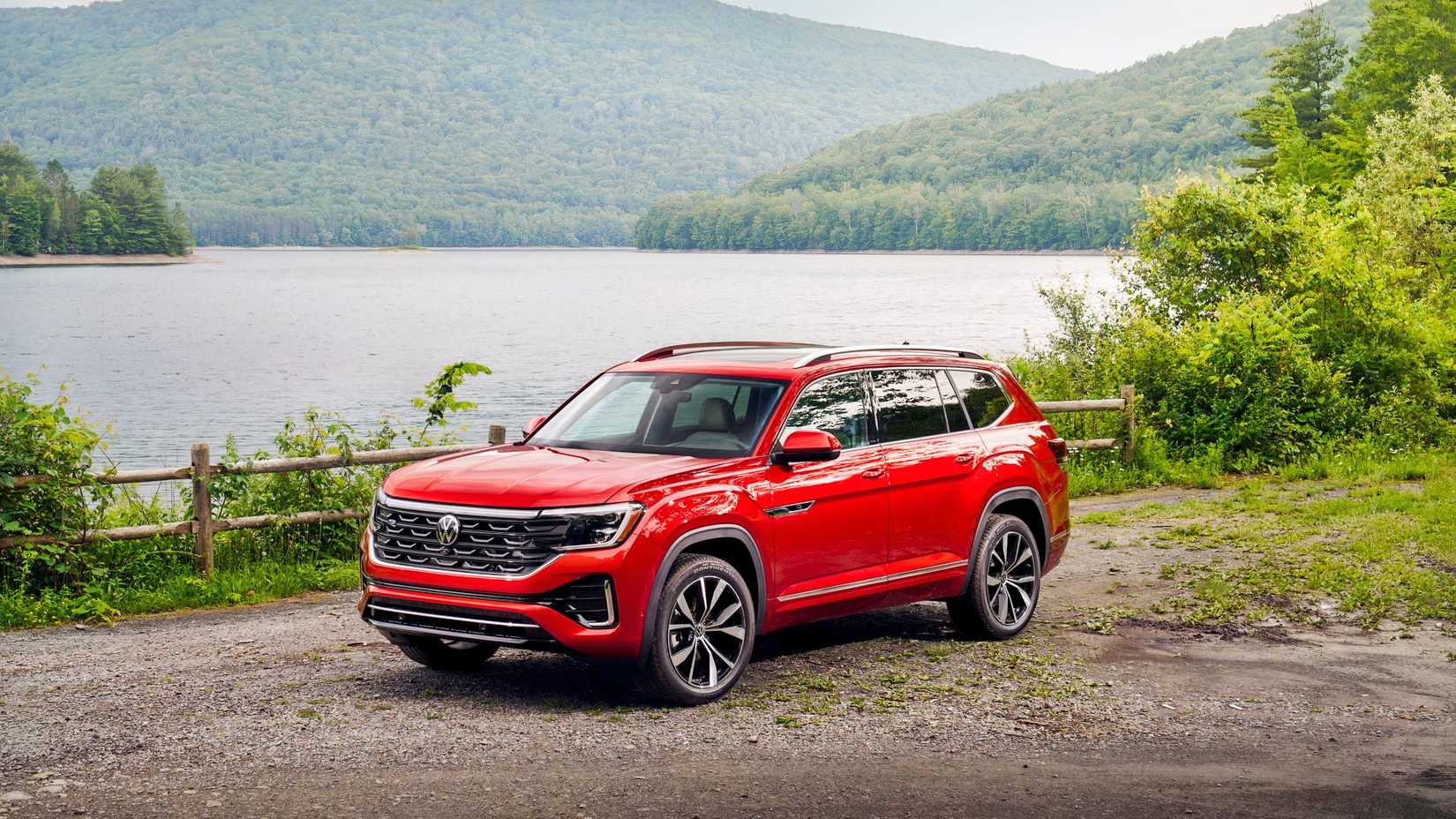 Red 2026 Volkswagen Atlas parked over-looking a lake 