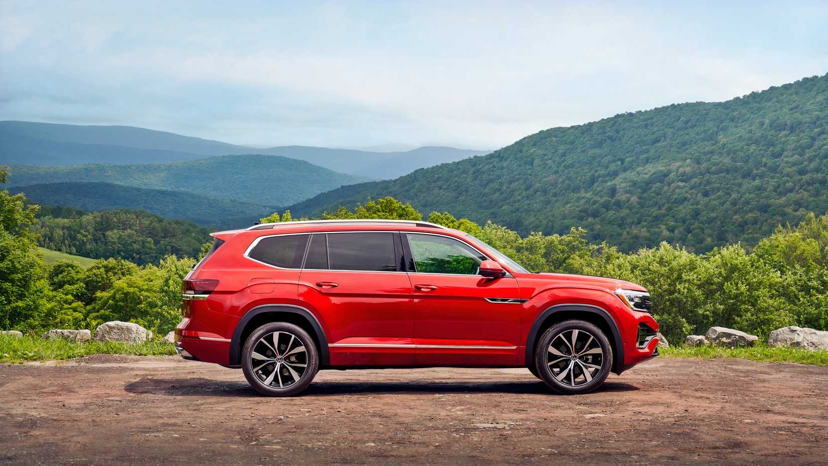 Red 2026 Volkswagen Atlas side shot parked off-road