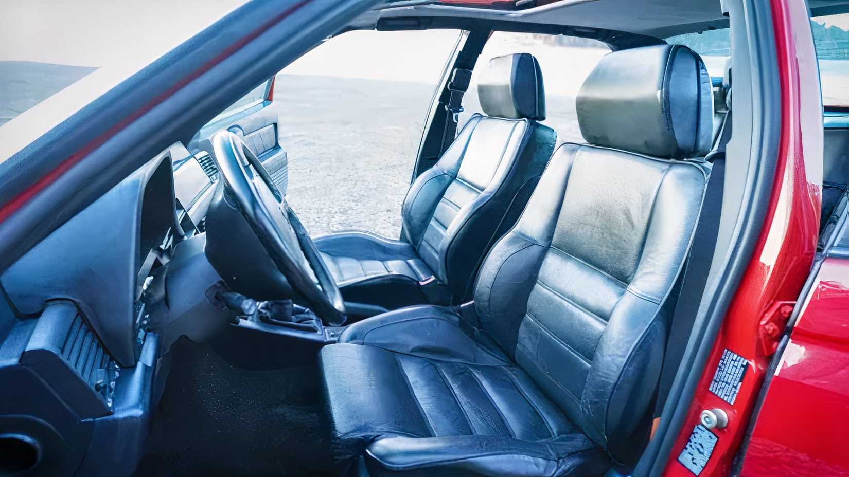 Interior shot of an Alfa Romeo 164 showing front seats