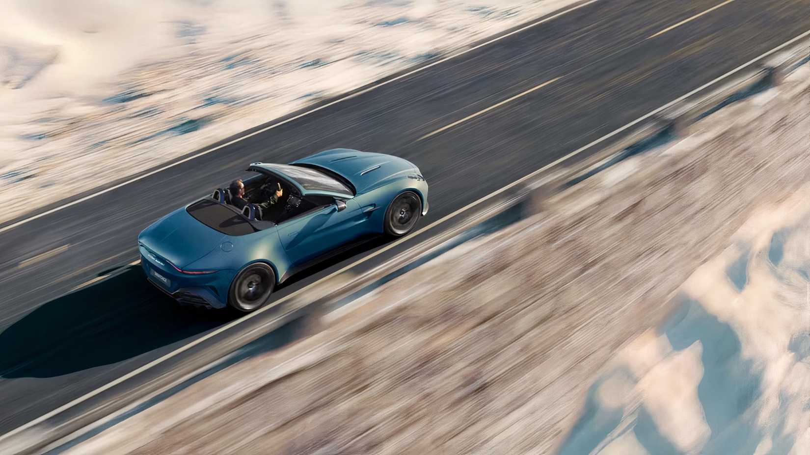 2026 Aston Martin Vantage Roadster rear 3/4 action