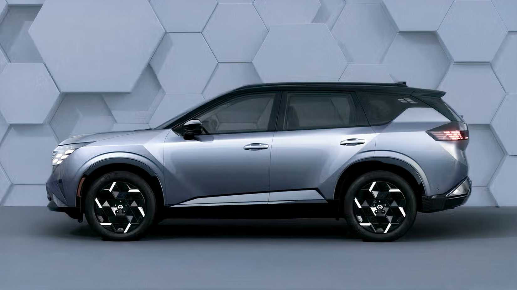 Profile shot of 2027 Nissan Rogue Hybrid parked