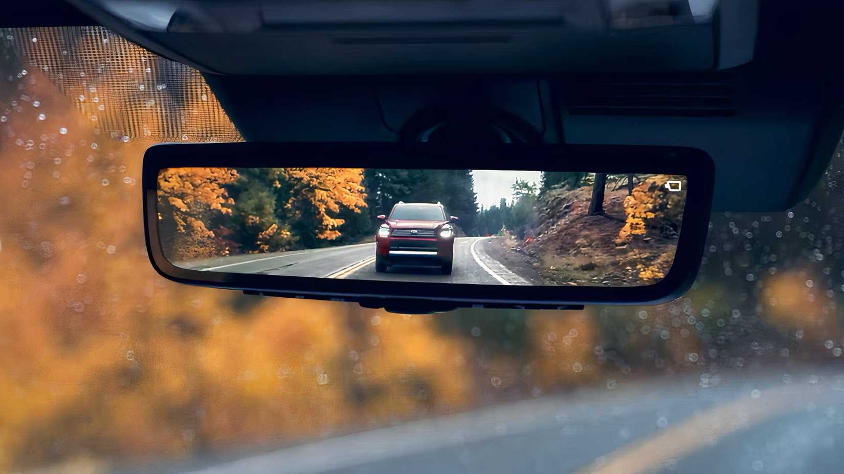 Front action shot of 2026 Toyota 4Runner in rearview mirror