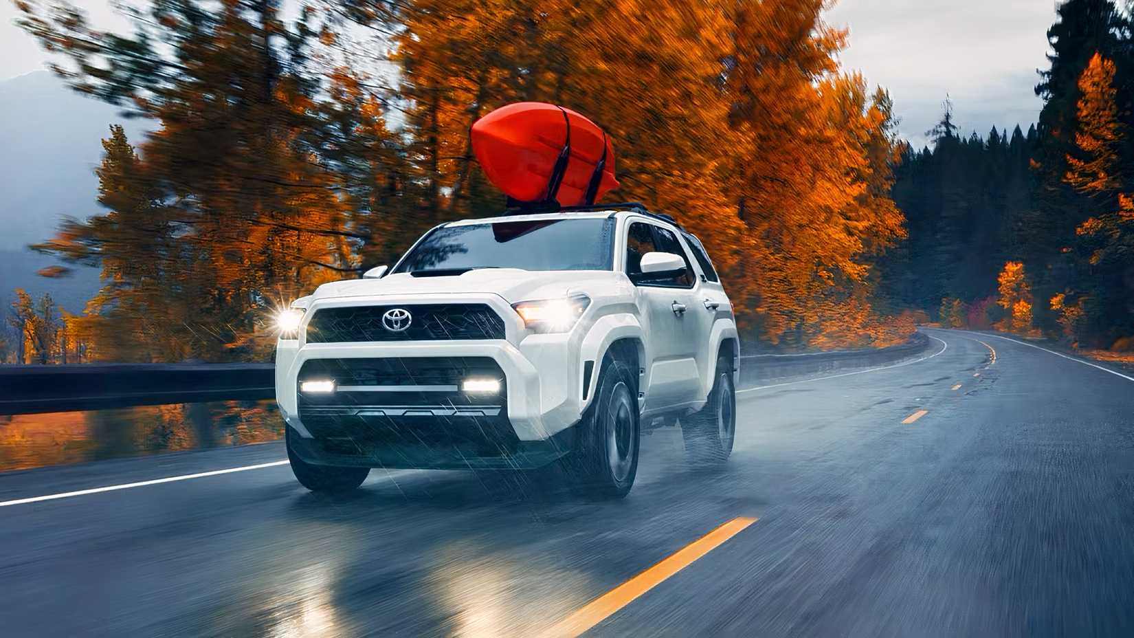 Front 3/4 action shot of 2026 Toyota 4Runner driving on road