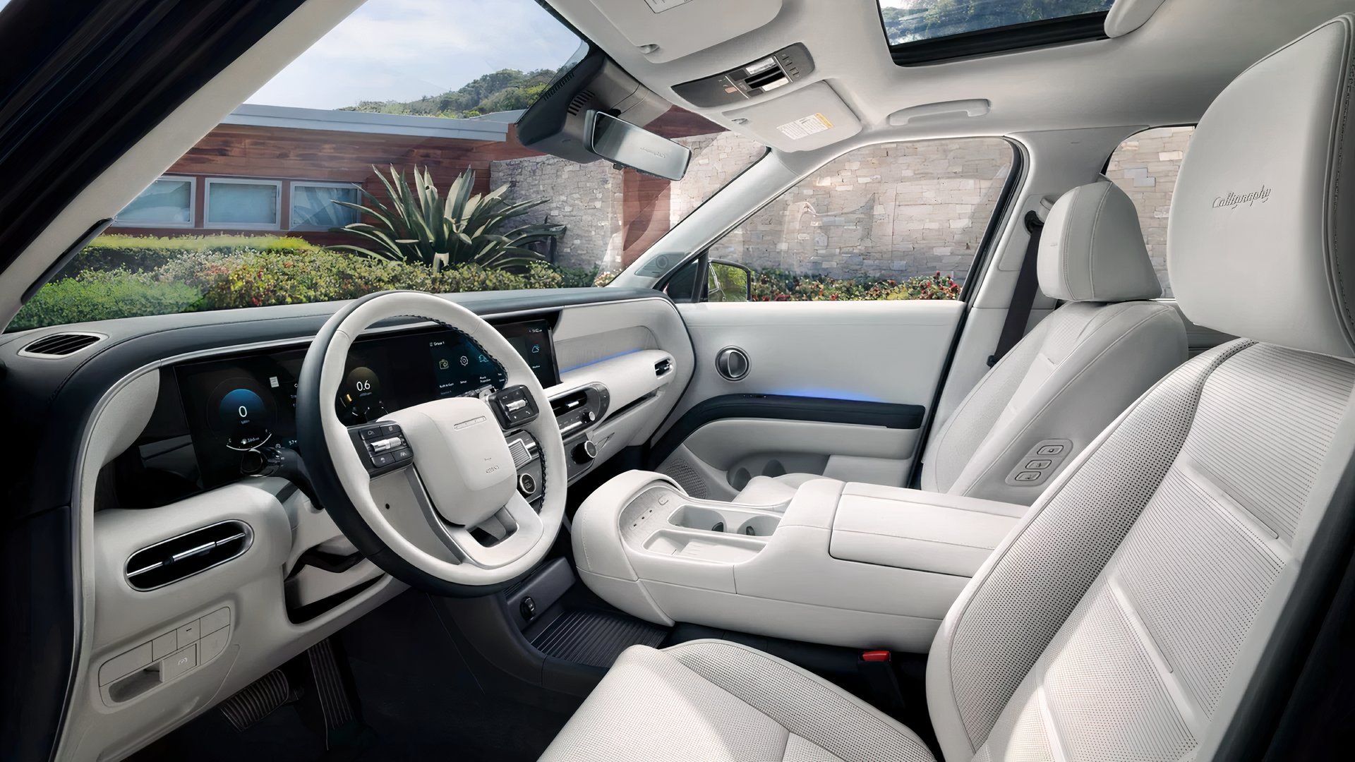 Foto do interior do Hyundai Palisade 2026 mostrando a cabine dianteira