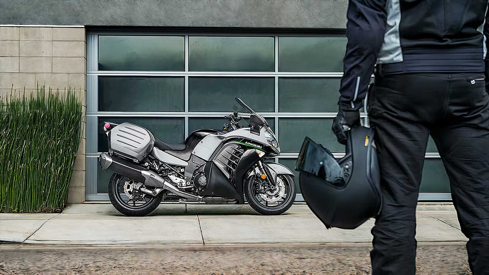 Kawasaki Concours 14 parked with rider facing it