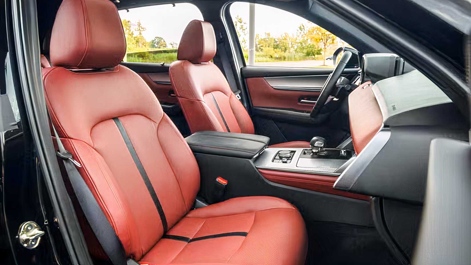 Interior shot of a Mazda CX-70 with Red Leather Front Seats