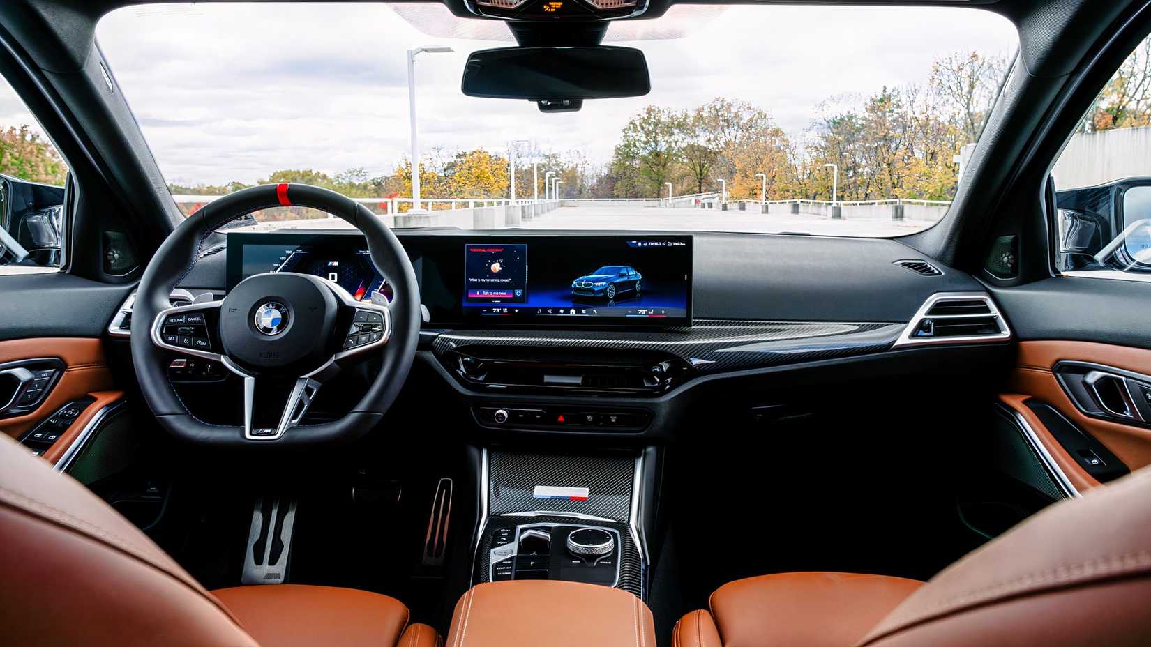Foto do interior do BMW M340i 2026 mostrando a cabine