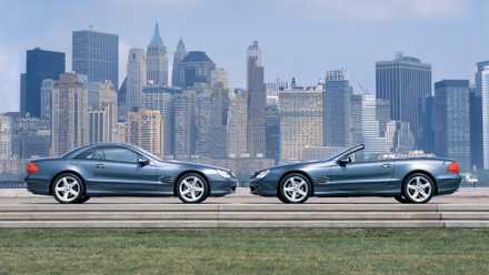 A set of R230 Mercedes-Benz SL roadsters parked in front of the New York City skyline