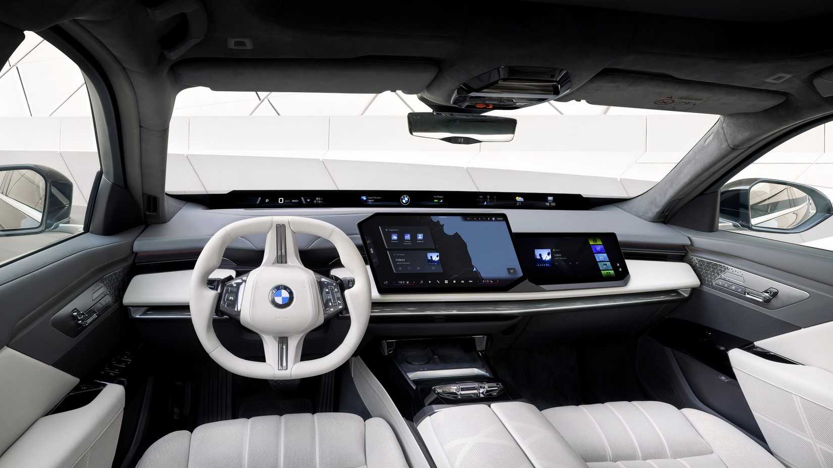Interior shot of a 2027 BMW 7 Series showing front cabin