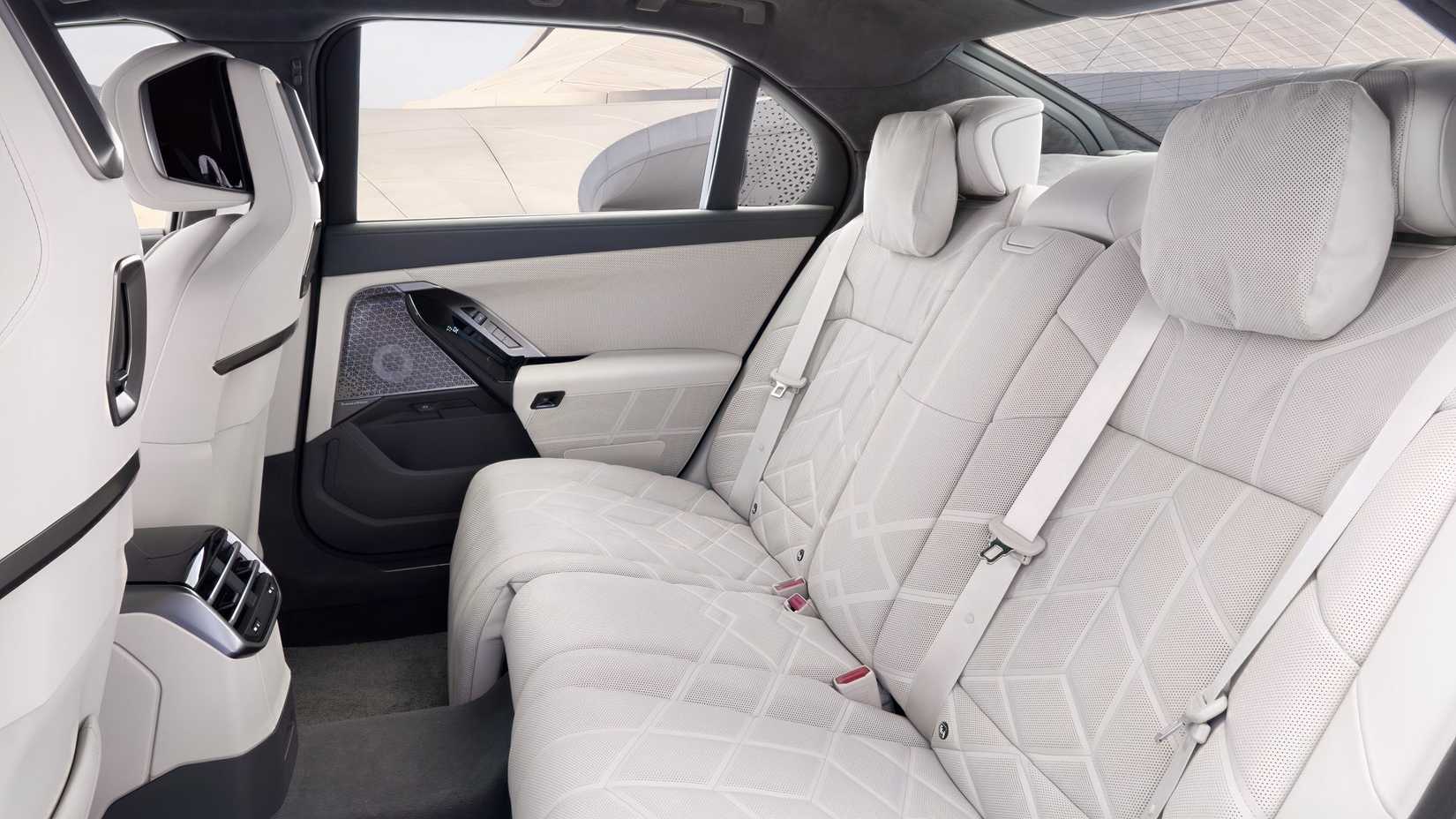 Interior shot of a 2027 BMW 7 Series showing rear seats
