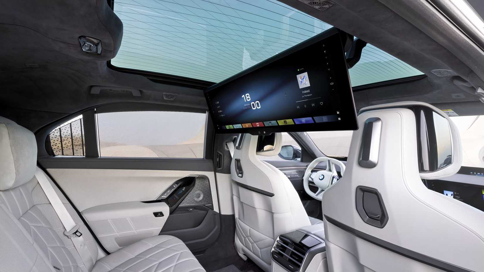 Interior shot of a 2027 BMW 7 Series showing rear seats