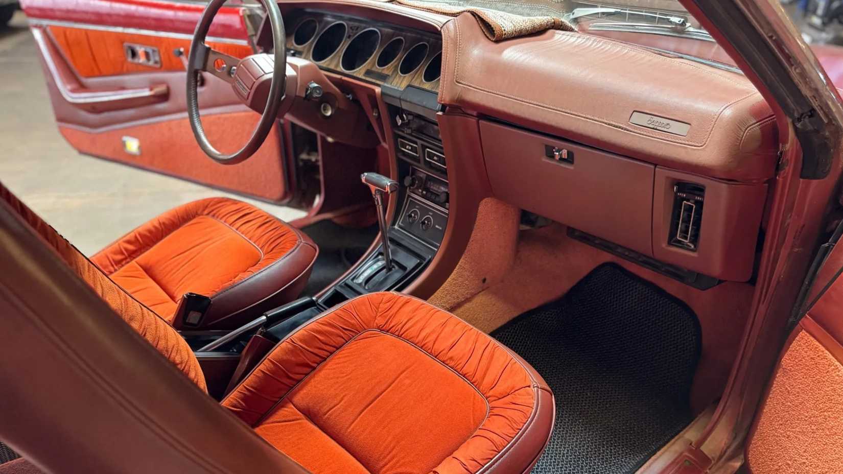 Interior shot of a 1978 Plymouth Sapporo showing front seats