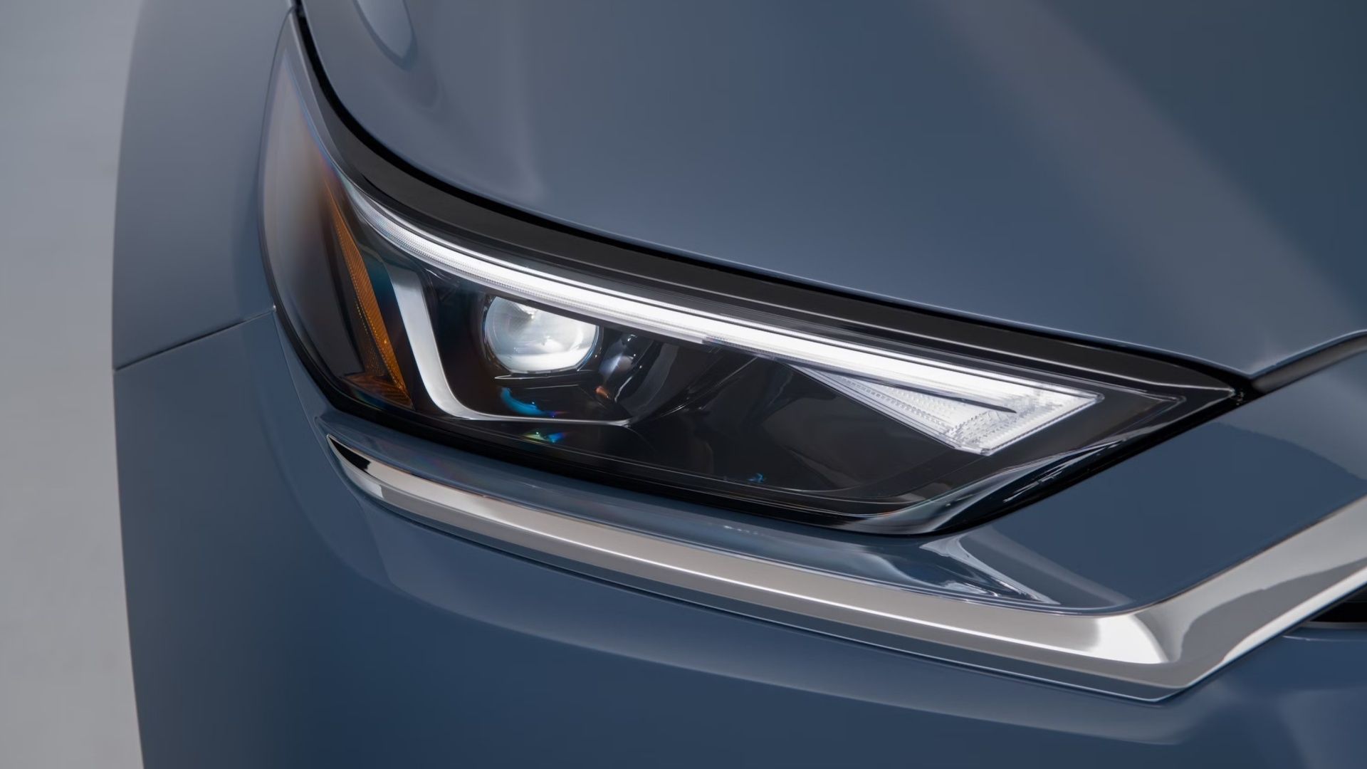 Front close-up of a 2026 Toyota Grand Highlander headlight