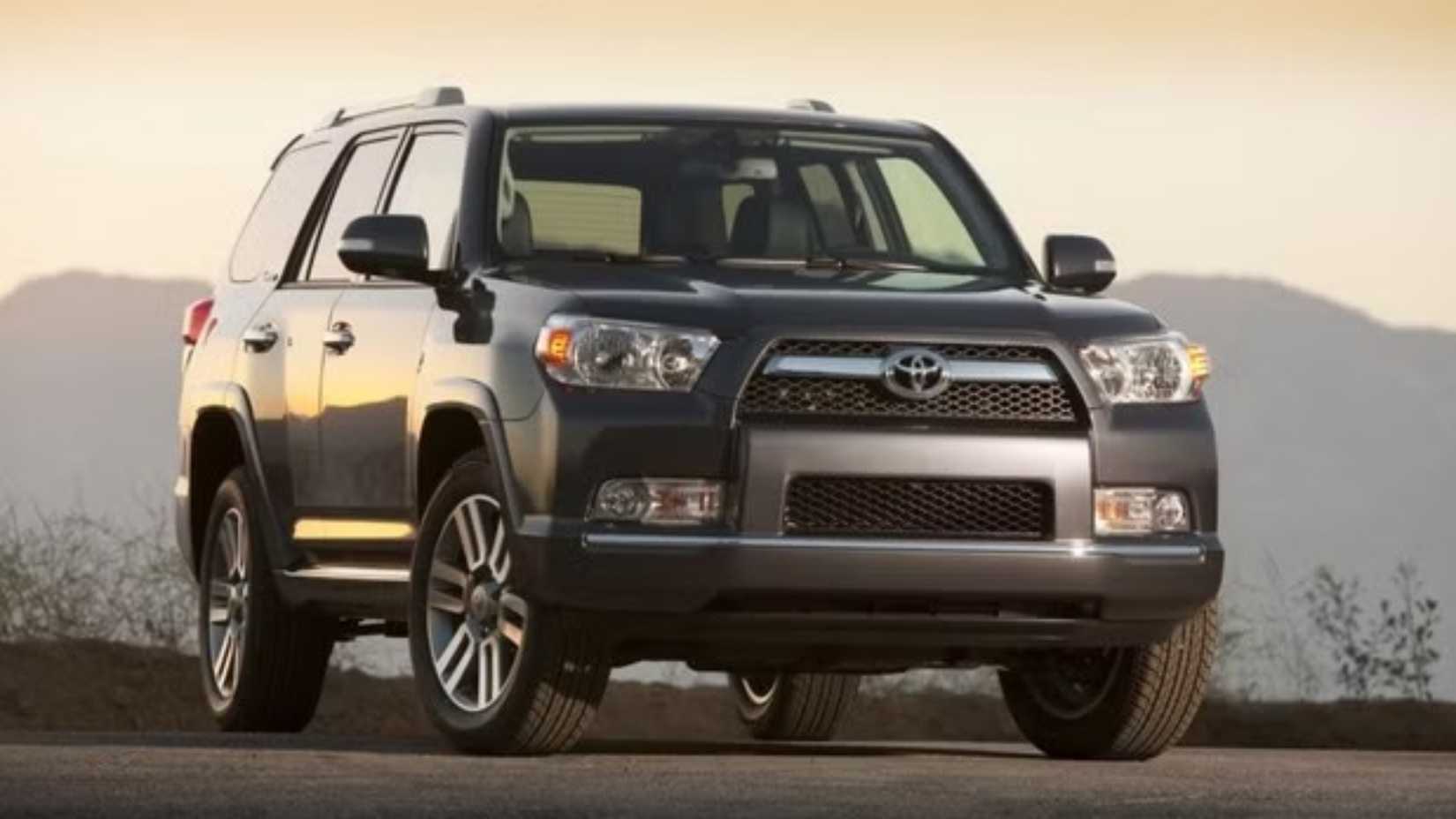 Front shot of a 2011 Toyota 4Runner parked in rural area