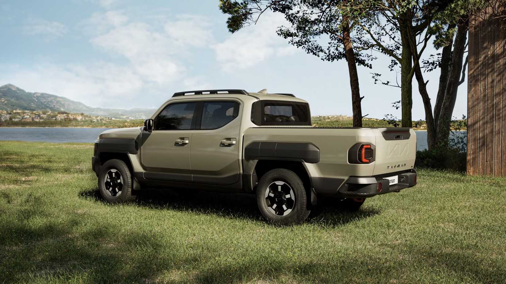 Rear 3/4 shot of a 2025 Kia Tasman parked off-road