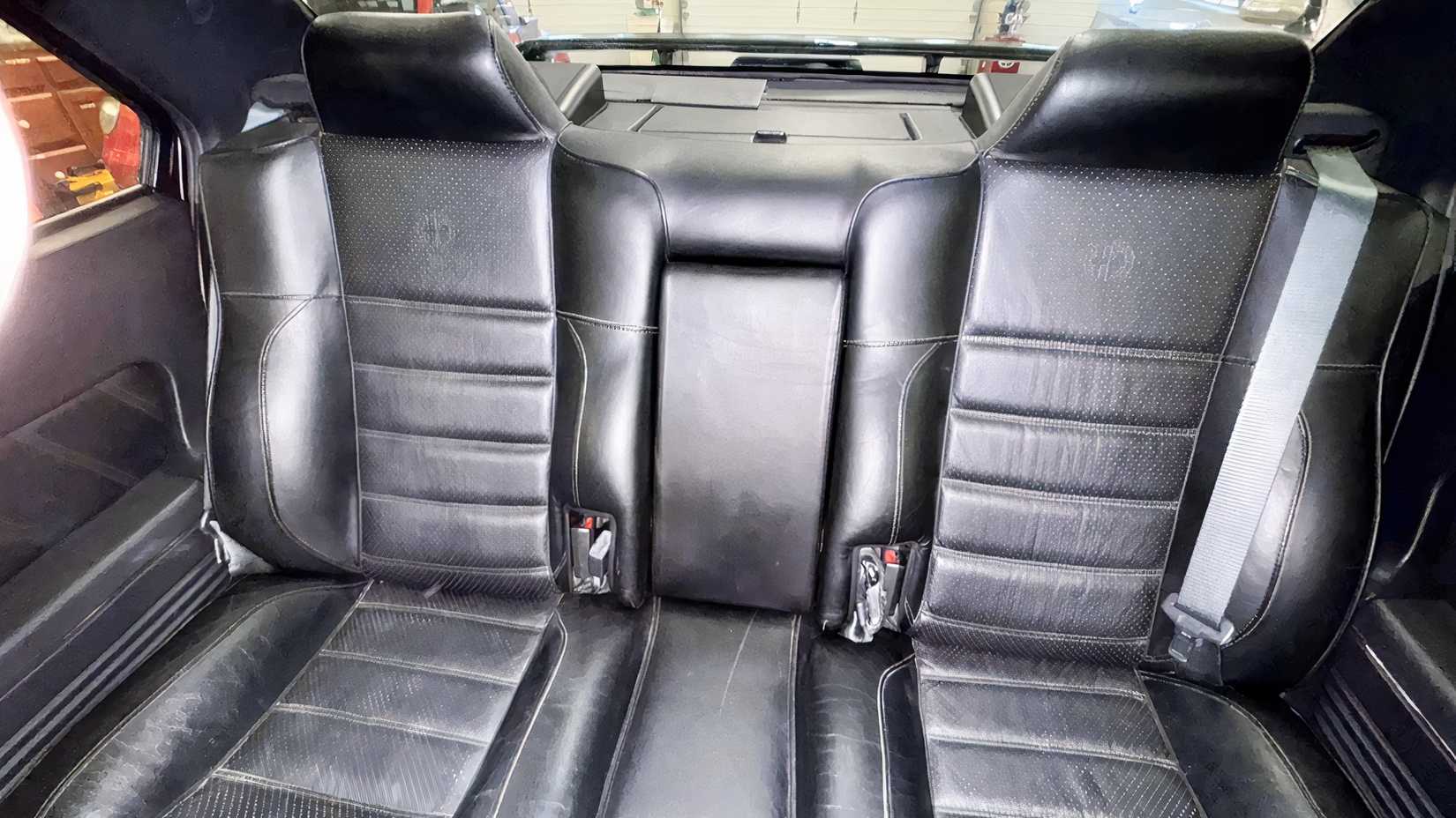 Interior shot of a 1995 Alfa Romeo 164 showing rear seats
