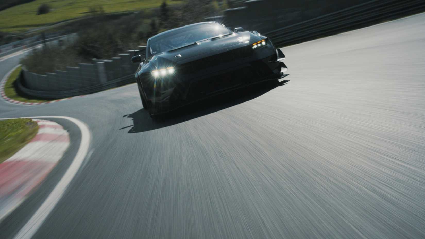 Front shot of a Ford Mustang GTD Competition driving on track