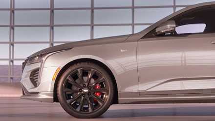 Front-end shot of a 2026 Cadillac CT4 parked indoors
