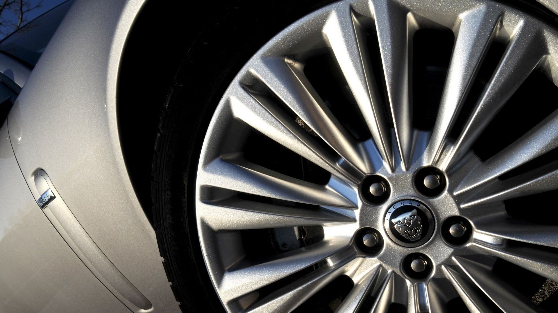 Close-up shot of a 2011 Jaguar XK's wheel