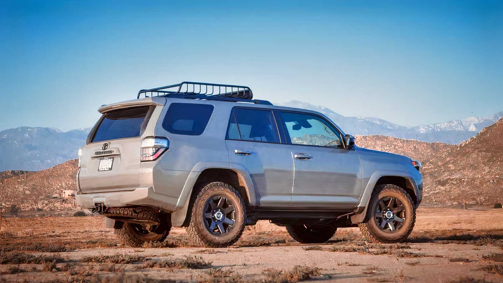 Rear 3/4 shot of a 2017 Toyota 4Runner parked off-road
