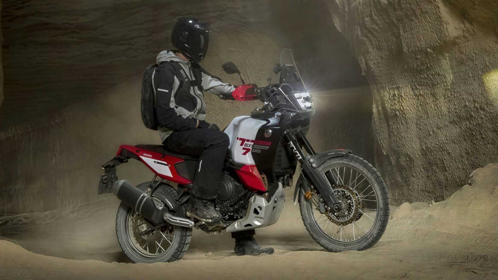 Yamaha Tenere 700 World Raid parked on a trail route cinematic side profile view