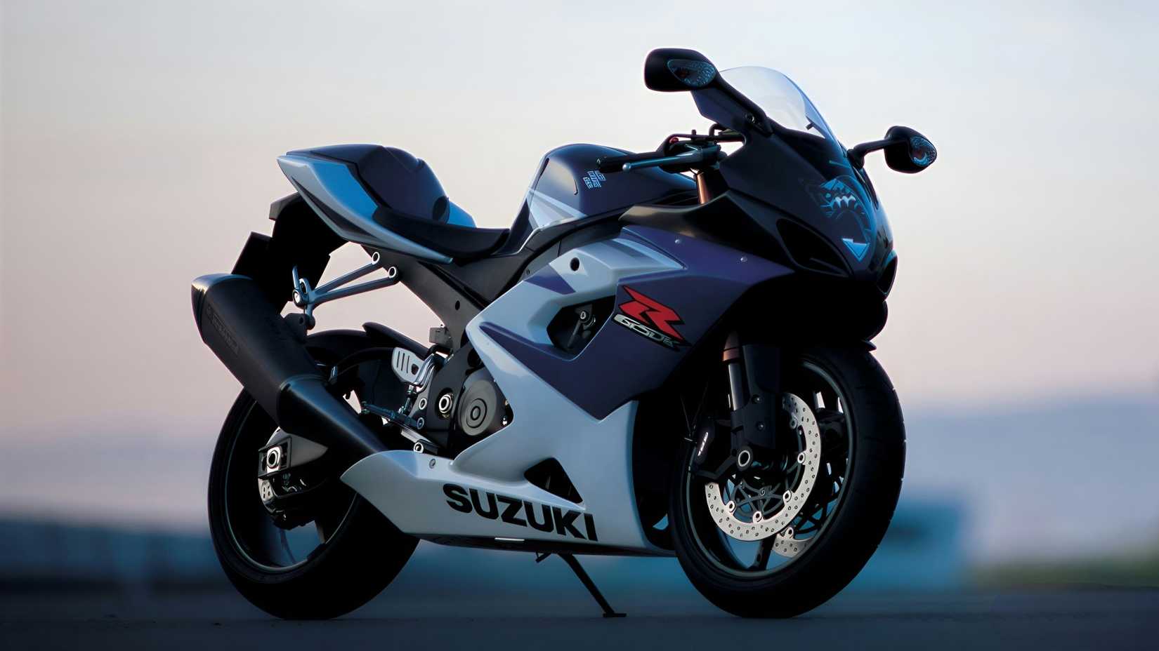 2005 Suzuki GSX-R1000 parked on a racetrack front third quarter view