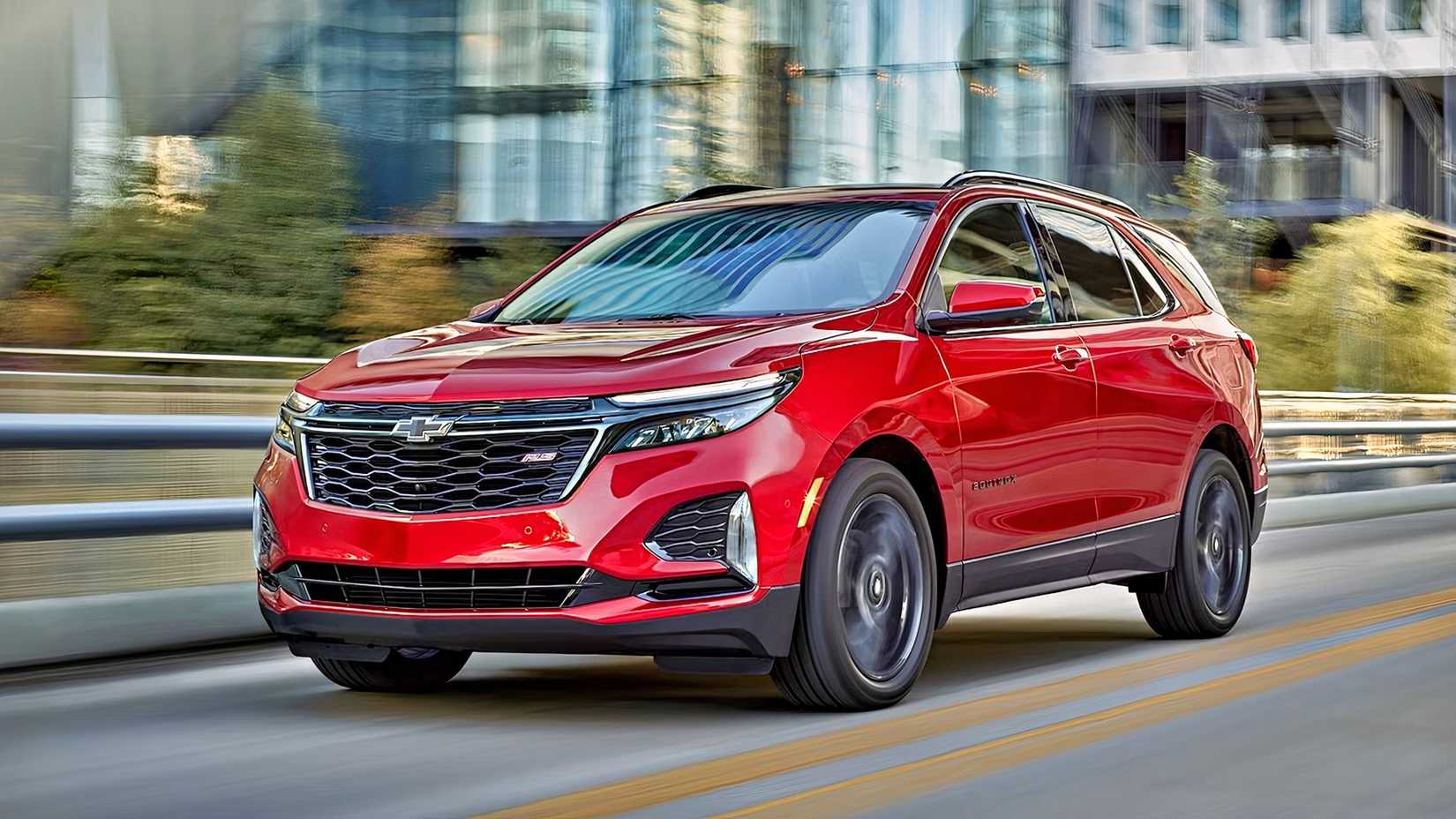 2023 Chevrolet Equinox RS front 3/4 shot driving down the road