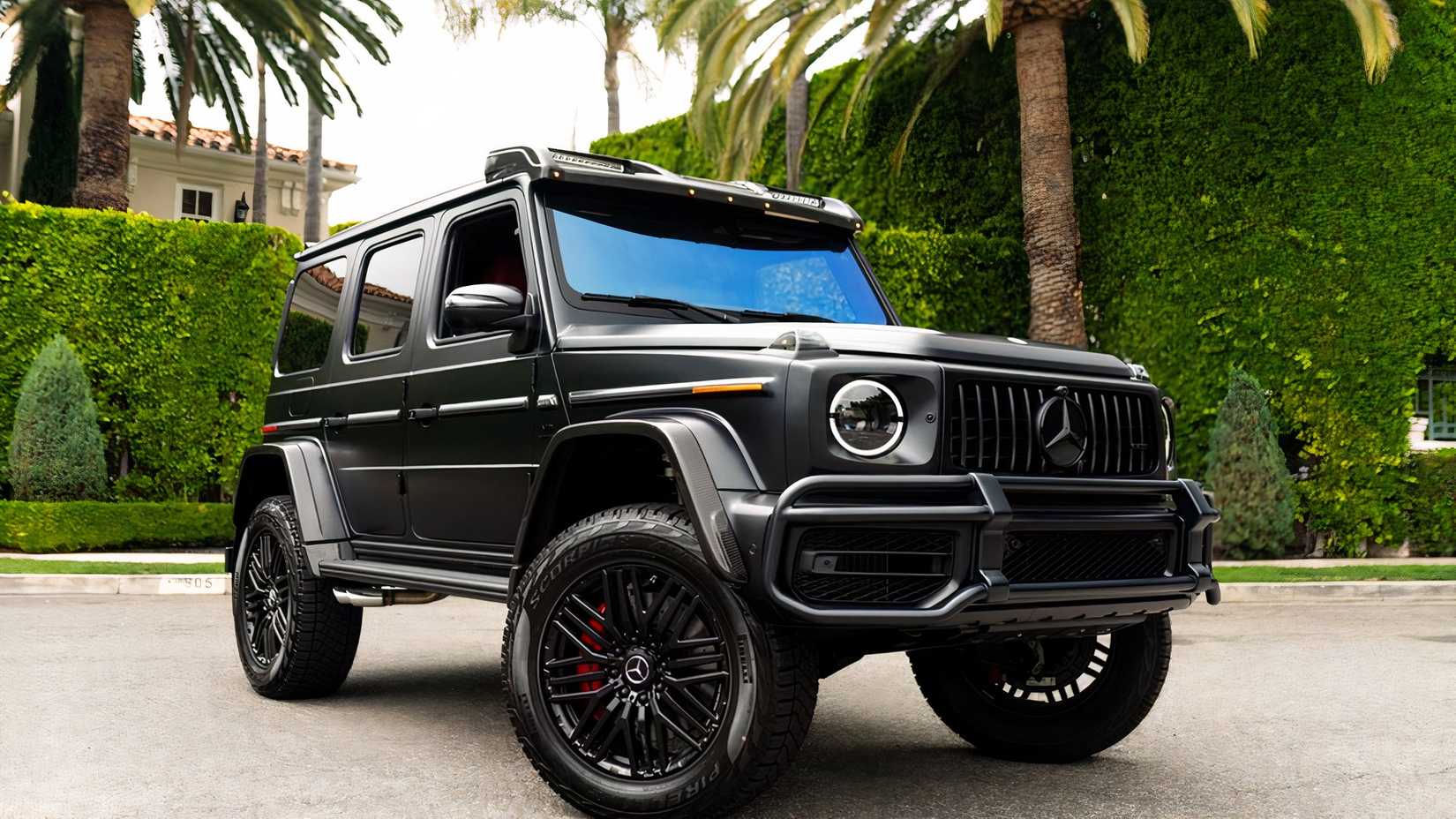 2023 Mercedes-AMG G 63 front 3/4 shot parked in front of house