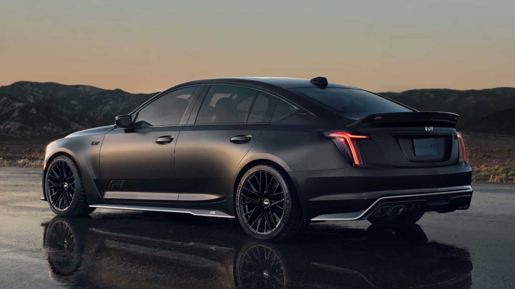 The rear 3/4 view of a black 2026 Cadillac CT5-V Blackwing F1 Collector Series.