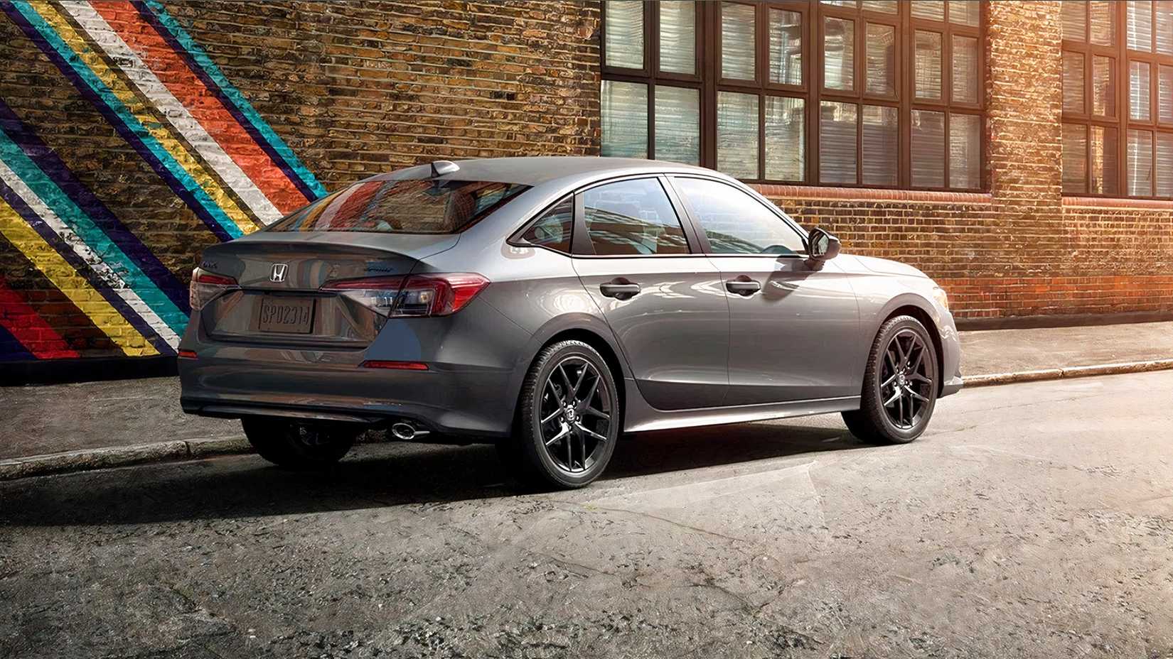 2026 Honda Civic sedan rear 3/4 shot parked on the street