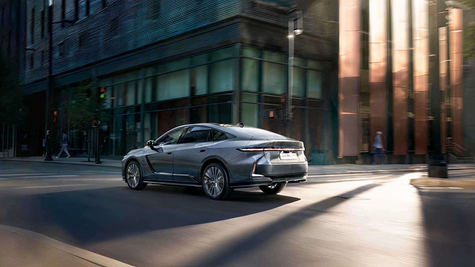 2026 Lexus ES 350 traseira 3/4 tiro dirigindo pela cidade