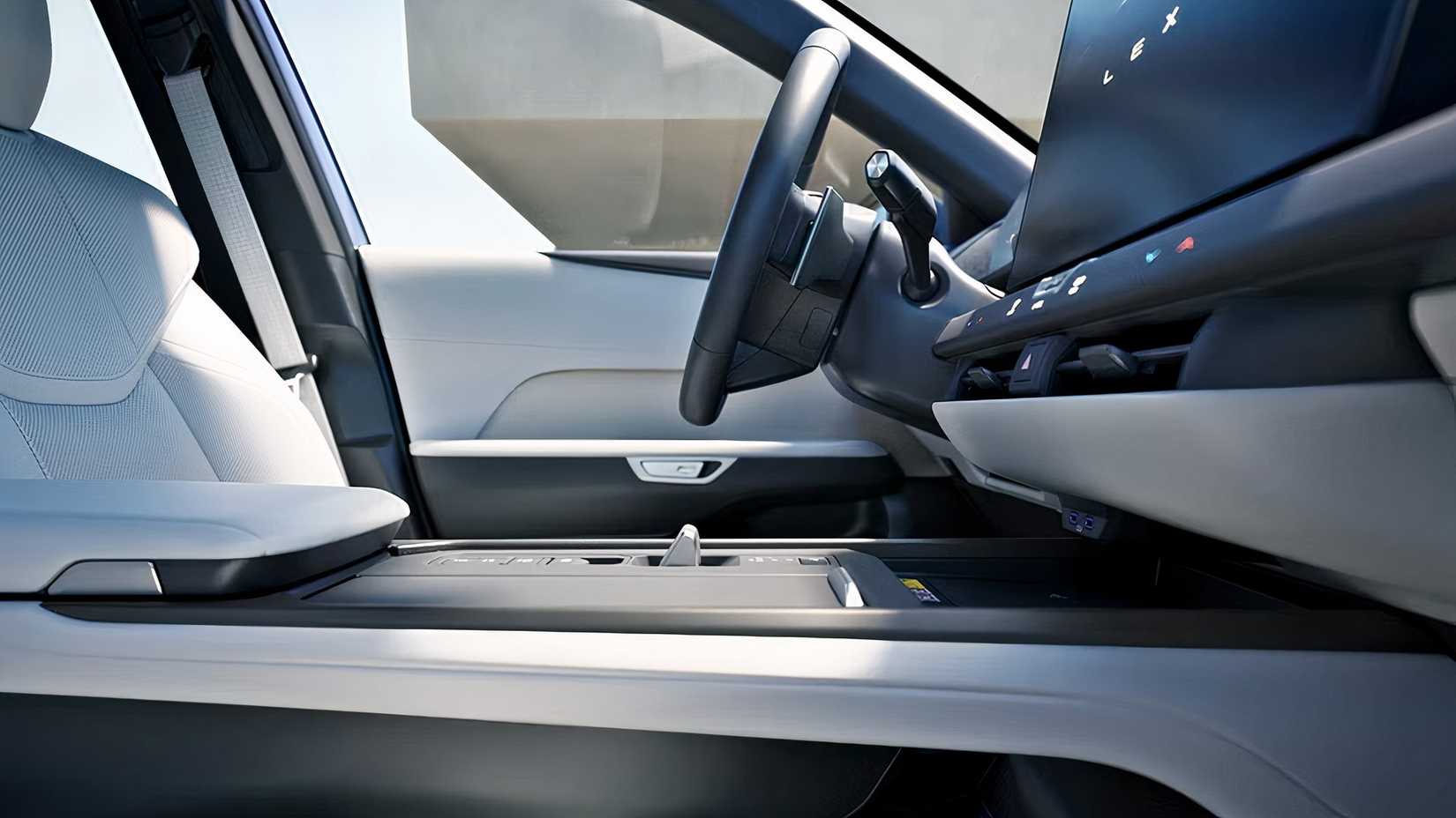 Foto do interior do Lexus ES 350h 2026 mostrando a cabine frontal