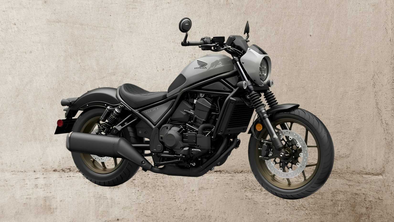 Vista frontal do terceiro trimestre do modelo de estilo personalizado Honda Rebel 1100 SE DCT 2026