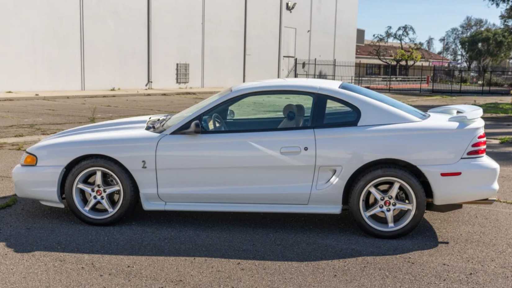 1995 Ford Mustang SVT Cobra R side profile parked in the lot