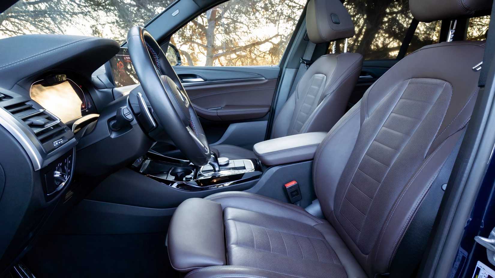 2022 BMW X3 M40i interior shot showing front seats