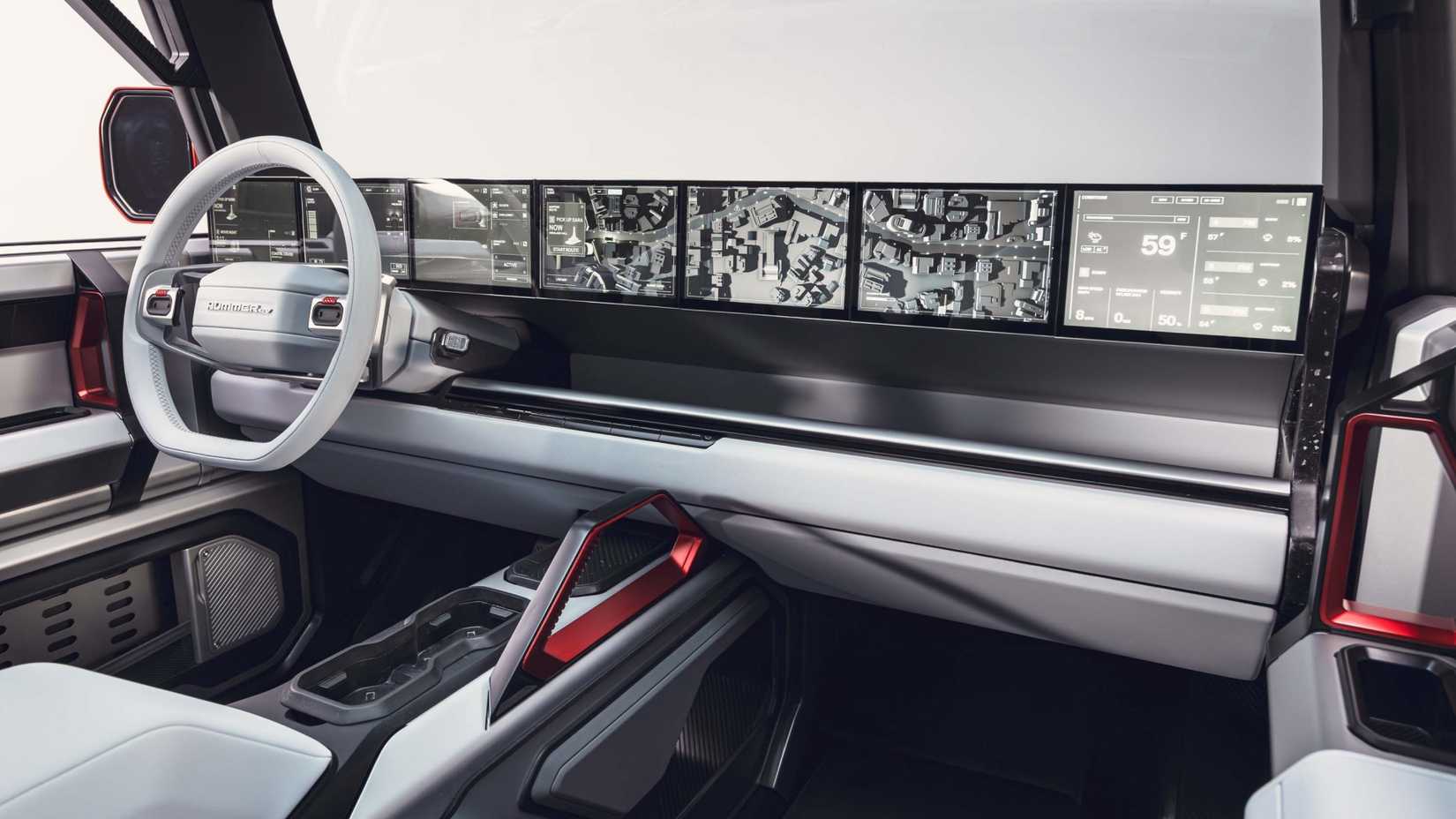 Foto do interior do conceito GMC Hummer X mostrando telas do painel