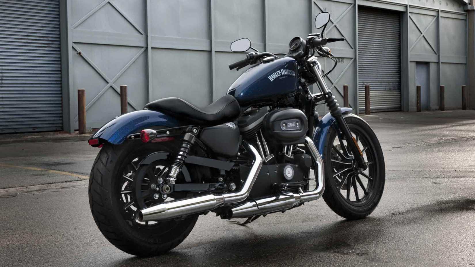 2010 Harley-Davidson Sportster Iron 883 parked rear third quarter view
