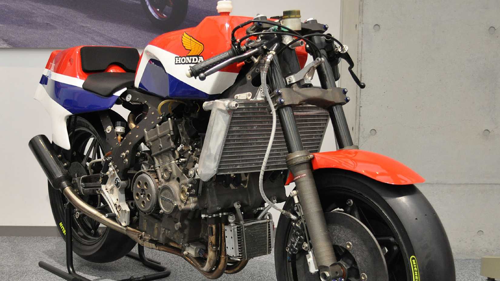 Honda NR500 without its fairings on a display