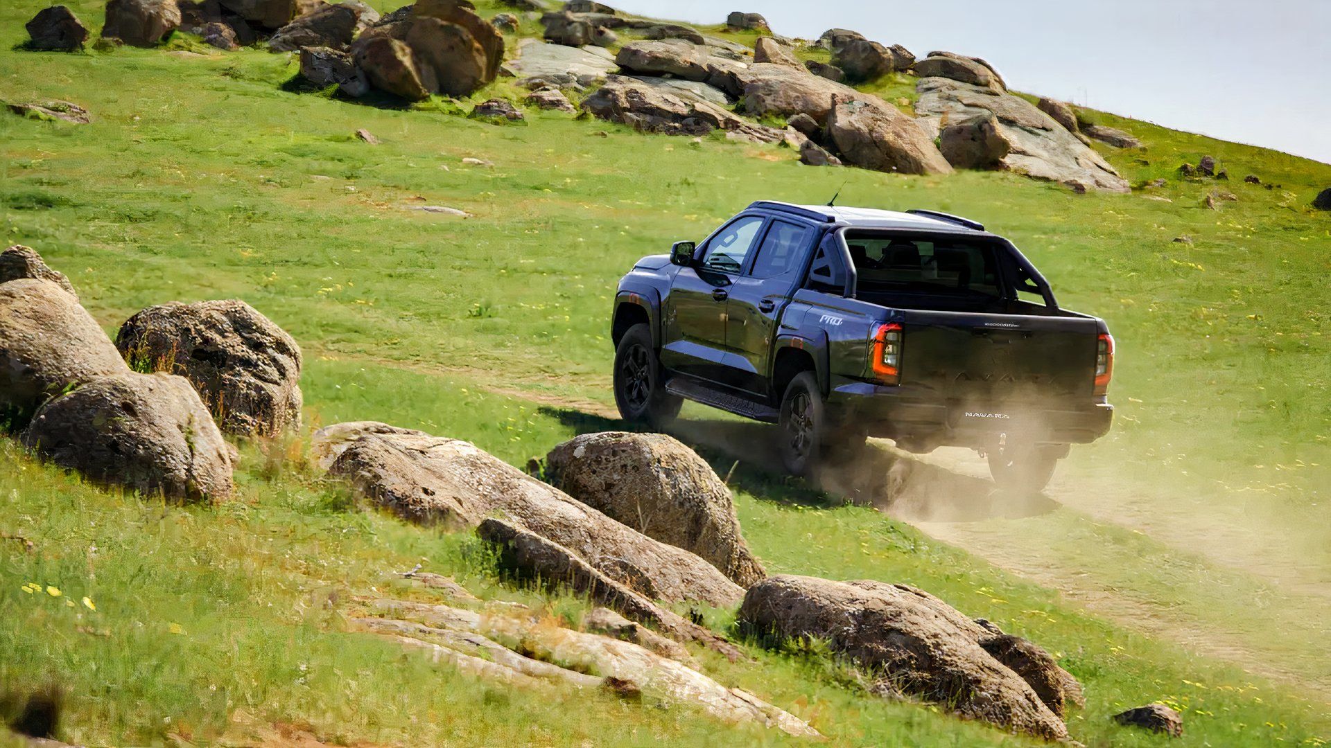 2026 Nissan Navara rear 3/4 action driving off-road