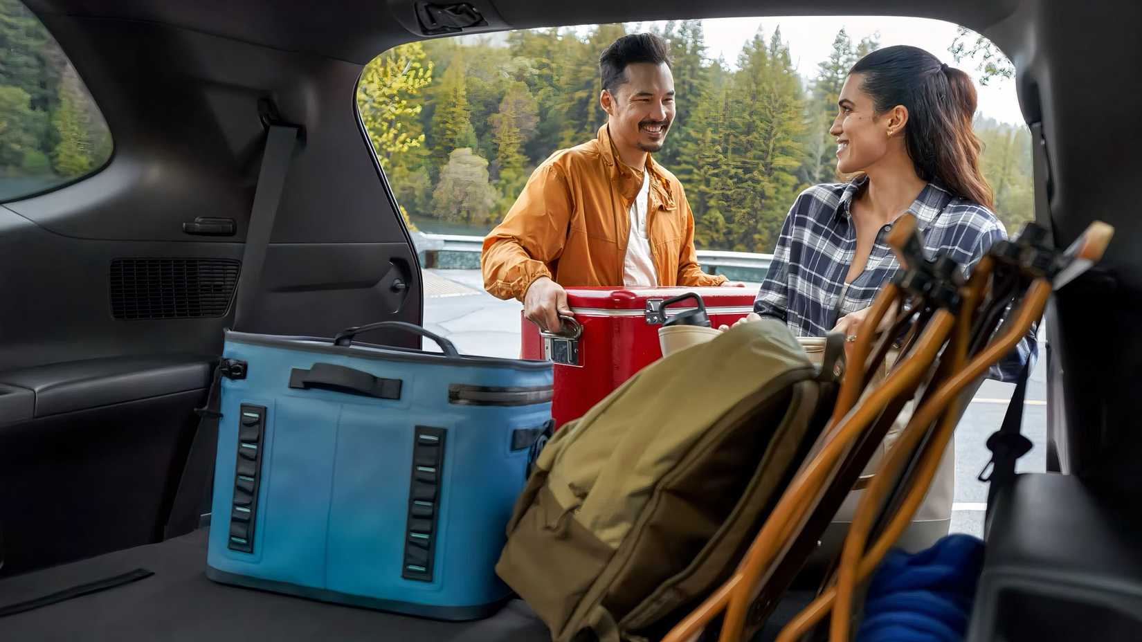 2026 Toyota Grand Highlander Hybrid cargo area being loaded